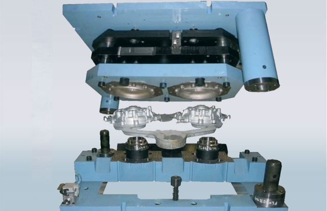 Material removal with trim dies