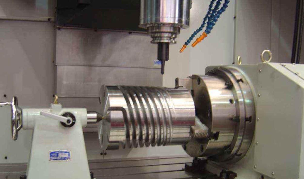 Simultaneous (True) four axis CNC Machining Center