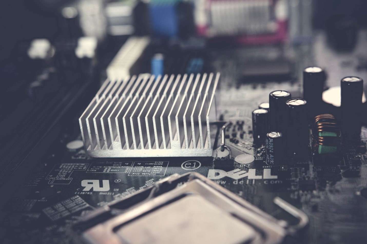 The difference between extruded and cast aluminum and the image shows an extruded part of aluminum used as a PC motherboard entity